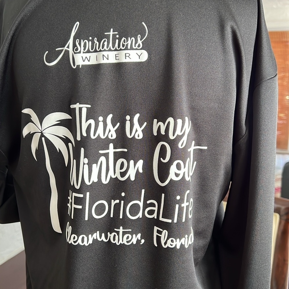 Black long sleeved top.  Size L
